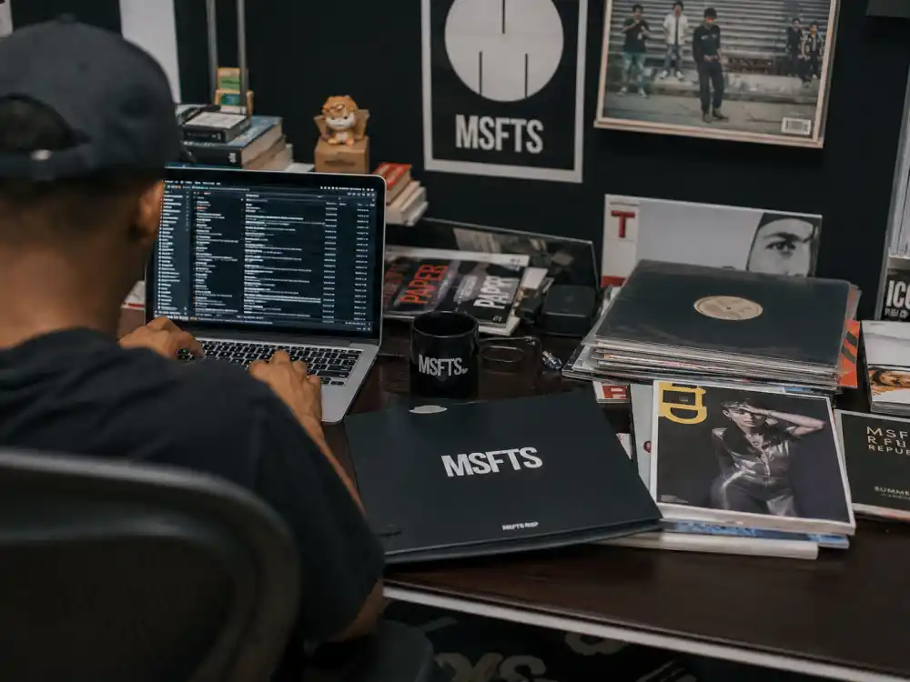 MSFTS record label desk from behind for Jaden Smith nepo baby music career indie label editorial without identifiable faces
