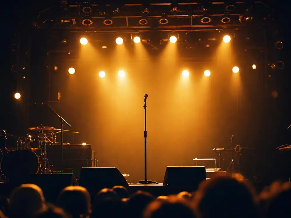 Concert stage spotlight for John Legend Chrissy Teigen new baby 2025 — Legend confirmed Esti birth at private show hours after Jan 13 2023 delivery