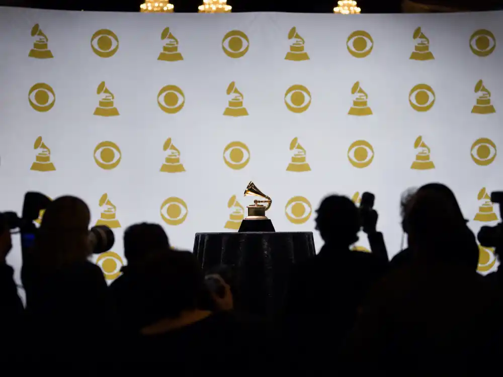 Grammy awards press wall step-and-repeat backdrop where Kanye West Grammy moments controversies unfold before live CBS cameras each February