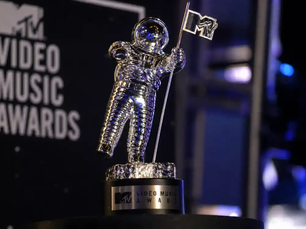 MTV Moon Person trophy microphone on VMA podium for Kanye West Taylor Swift VMA moment explained — the live mic that carried the 2009 interruption clip worldwide