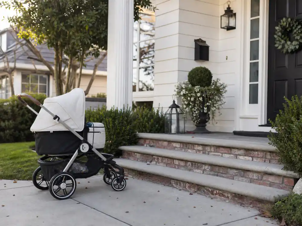 Family home doorstep with stroller for Keke Palmer pregnancy baby announcement motherhood chapter — co-parenting Leo with Darius Jackson per reporting