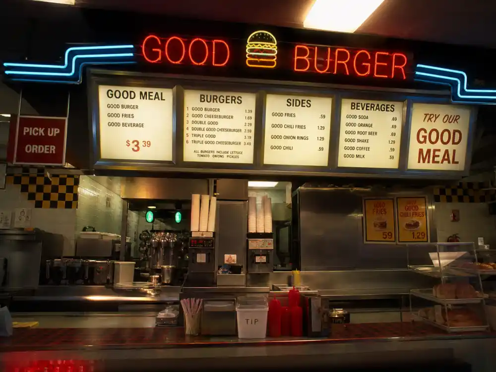 Retro 1990s fast-food burger counter evoking Kel Mitchell Good Burger Ed fame in 1997