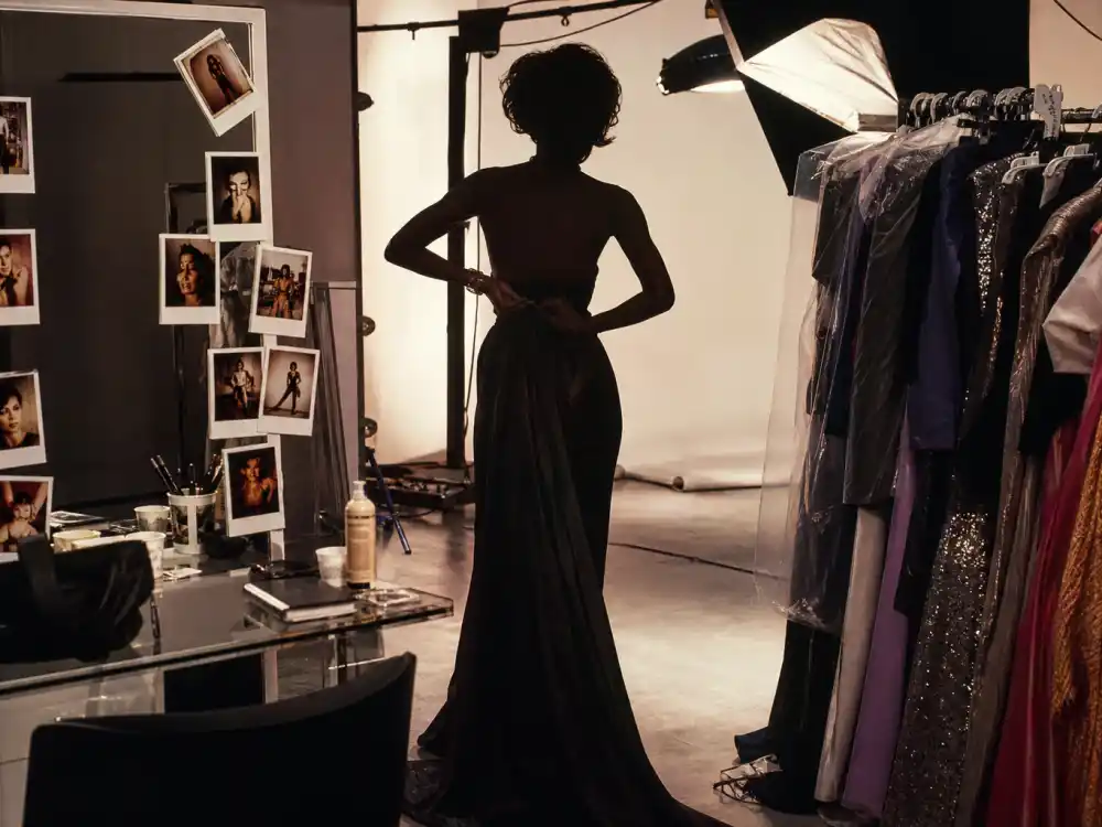 A 1980s fashion studio backstage scene for Kelly LeBrock supermodel career before Hollywood