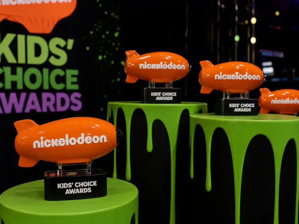 Orange Nickelodeon blimp trophies on display before the Kids Choice Awards 2026 winners list is finalized on November 14
