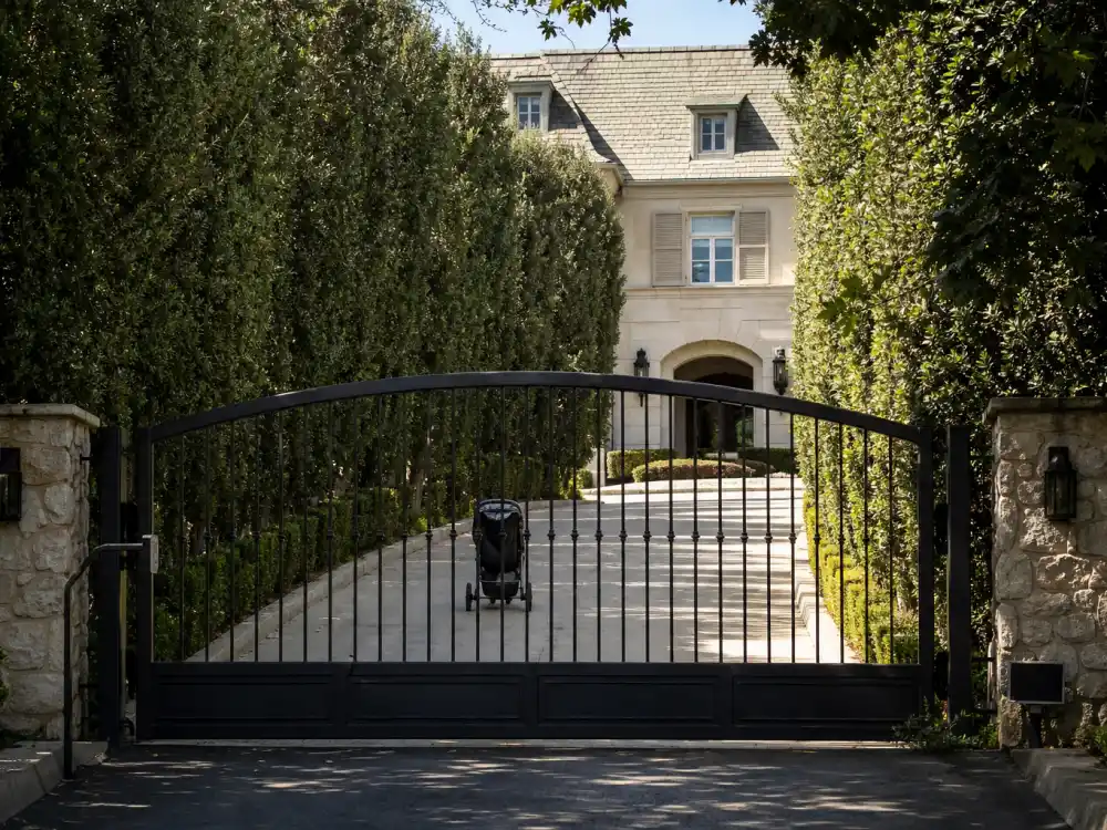 Gated home stroller silhouette for Kourtney Kardashian kids Mason Penelope Reign privacy era — limited face-forward paparazzi shots