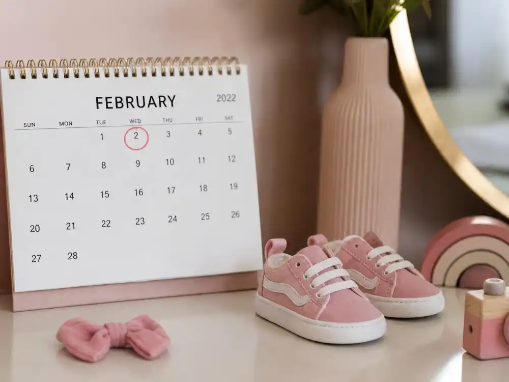 February 2 2022 calendar with toddler sneakers for Kylie Jenner kids names and ages — Aire Webster birth date per Us Weekly
