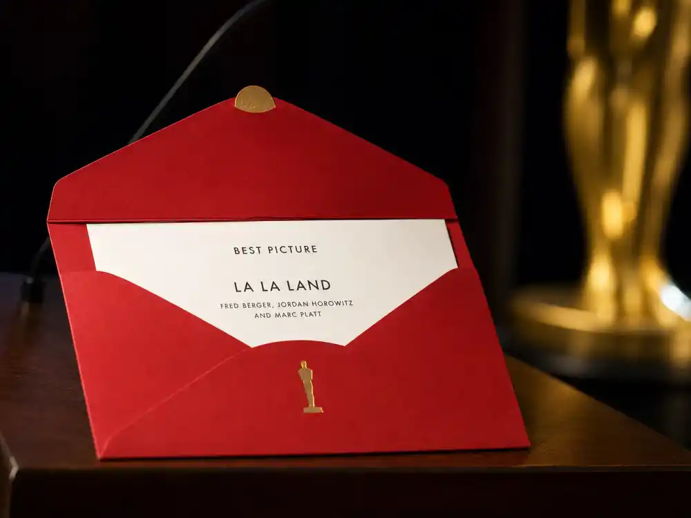 Red awards envelope opened on the podium at the center of the La La Land Moonlight best picture mistake at the 89th Academy Awards