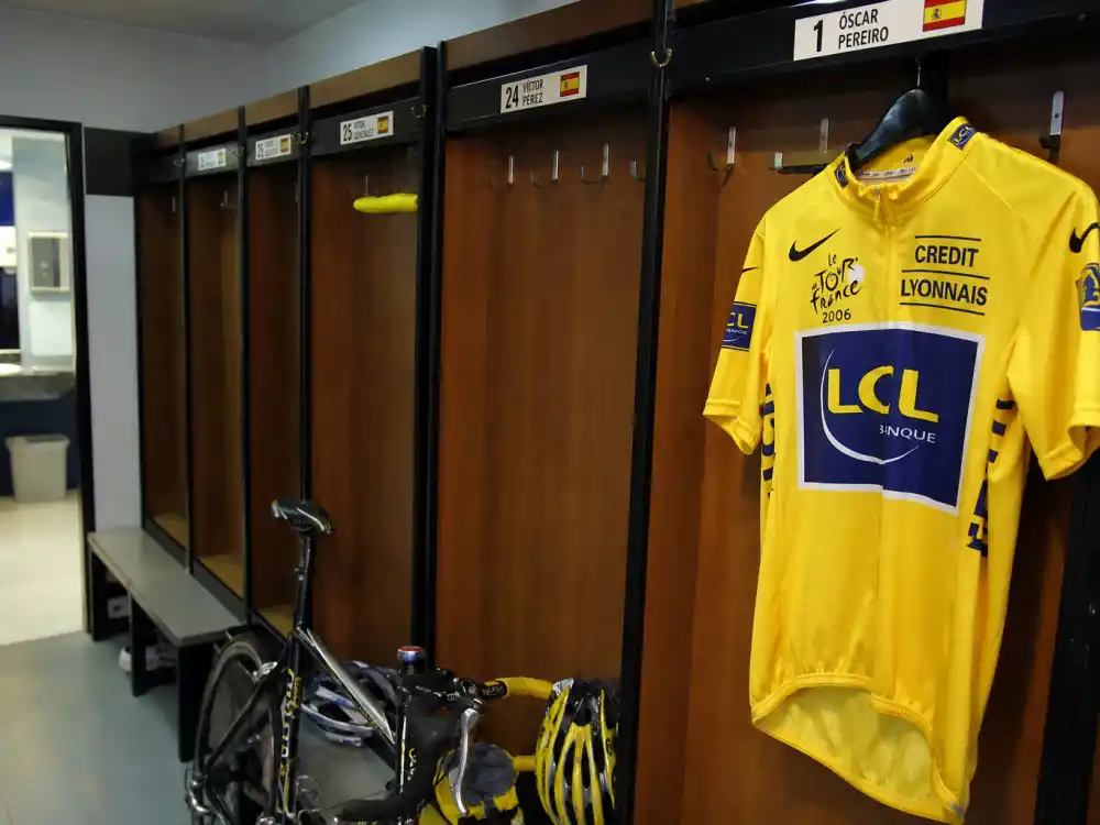 Cycling team locker room yellow jersey for what happened to Lance Armstrong during doping scandal fallout