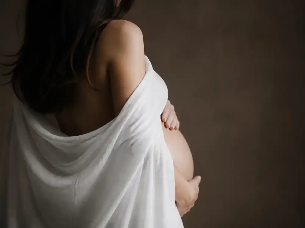 White shawl maternity silhouette for Lea Michele baby announcement second child — March 2024 Instagram reveal fans still search in 2026