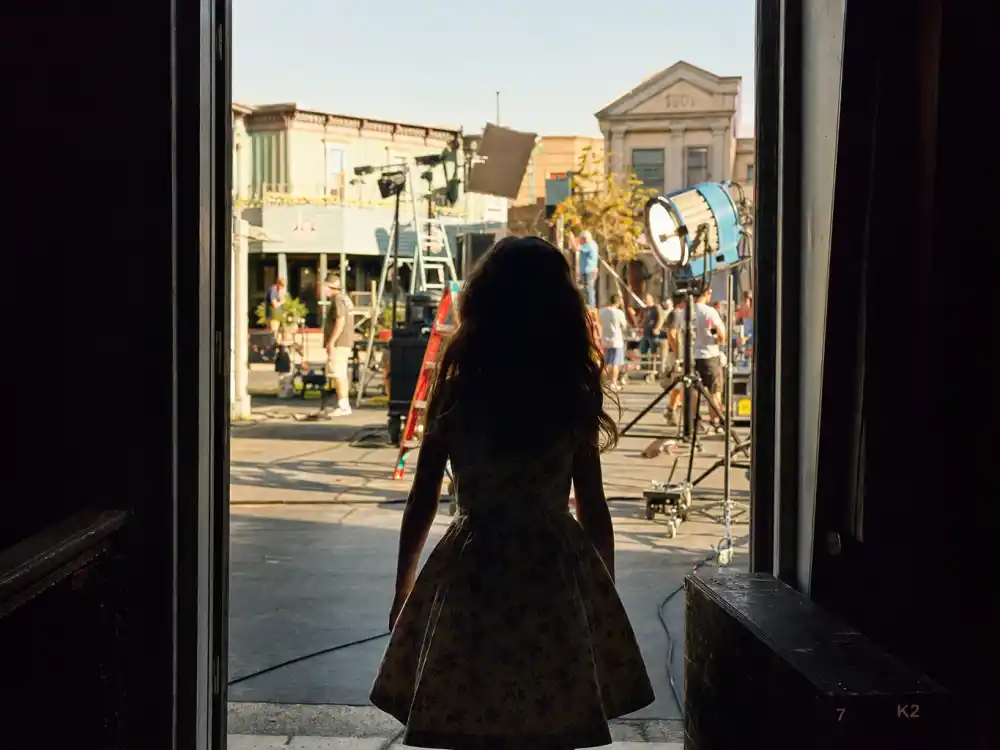 A 1990s family film studio set evoking Lindsay Lohan child star beginnings in Disney hits