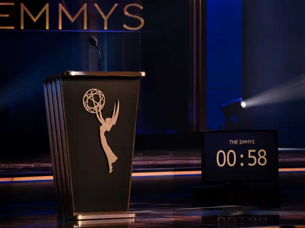 Emmy Awards television podium with winged statuette and countdown monitor — Primetime telecasts add their own chapter to longest acceptance speeches in history