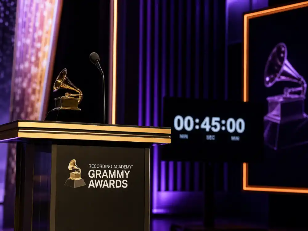 Grammy Awards podium with golden gramophone trophy and stage timer — Recording Academy nights contribute entries to the longest acceptance speeches in history