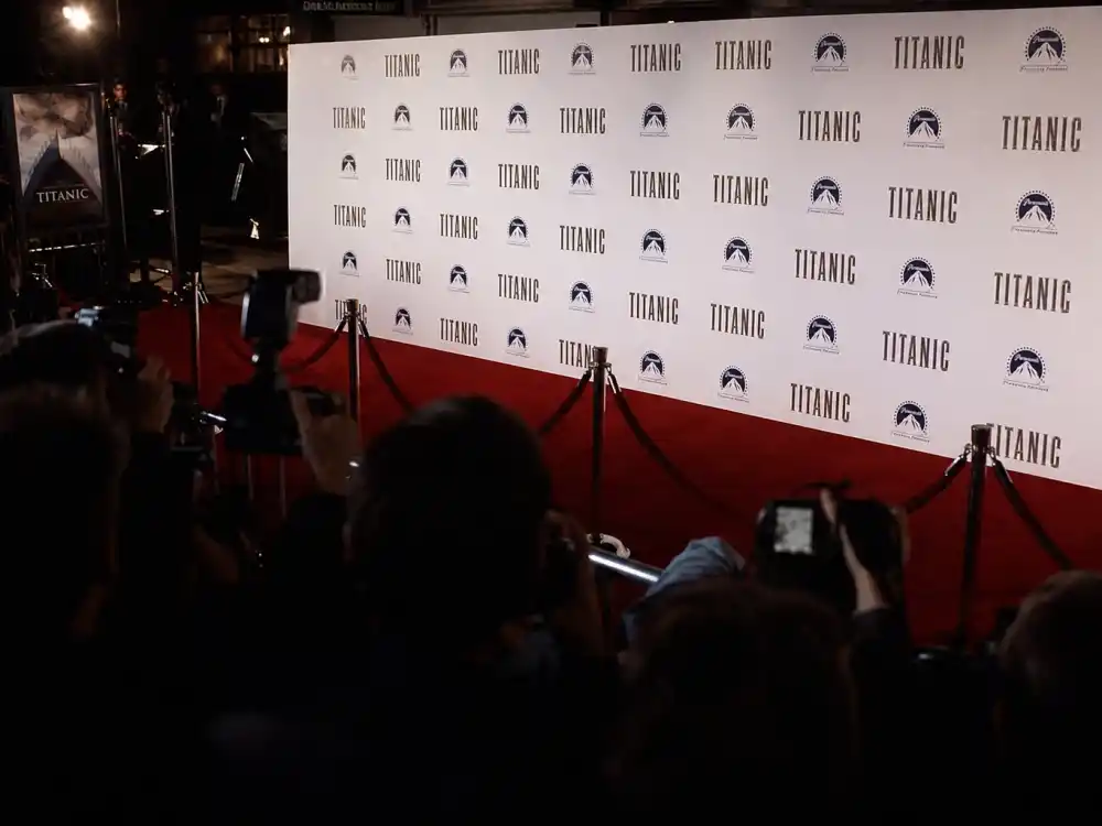A 1990s red carpet premiere backdrop representing Macaulay Culkin as the biggest child star in Hollywood