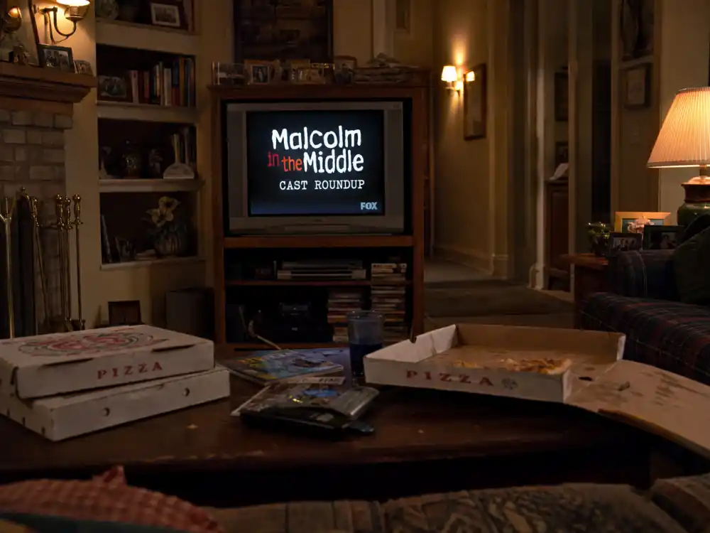 Sunday night living room TV setup evoking Fox era Malcolm in the Middle cast where are they now peak viewership