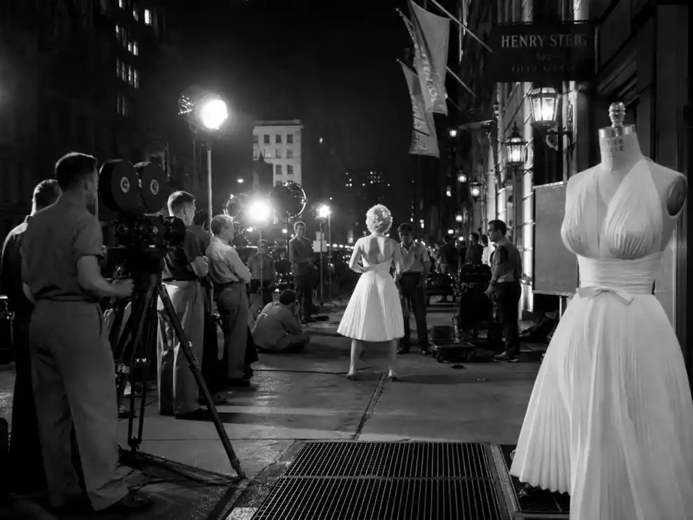 The Seven Year Itch 1955 film set atmosphere central to Marilyn Monroe white dress history and the Lexington Avenue subway grate shoot