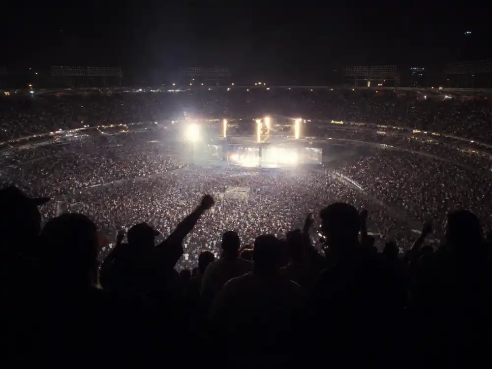 Stadium concert crowd for what happened to MC Hammer during parachute pants era arena tours