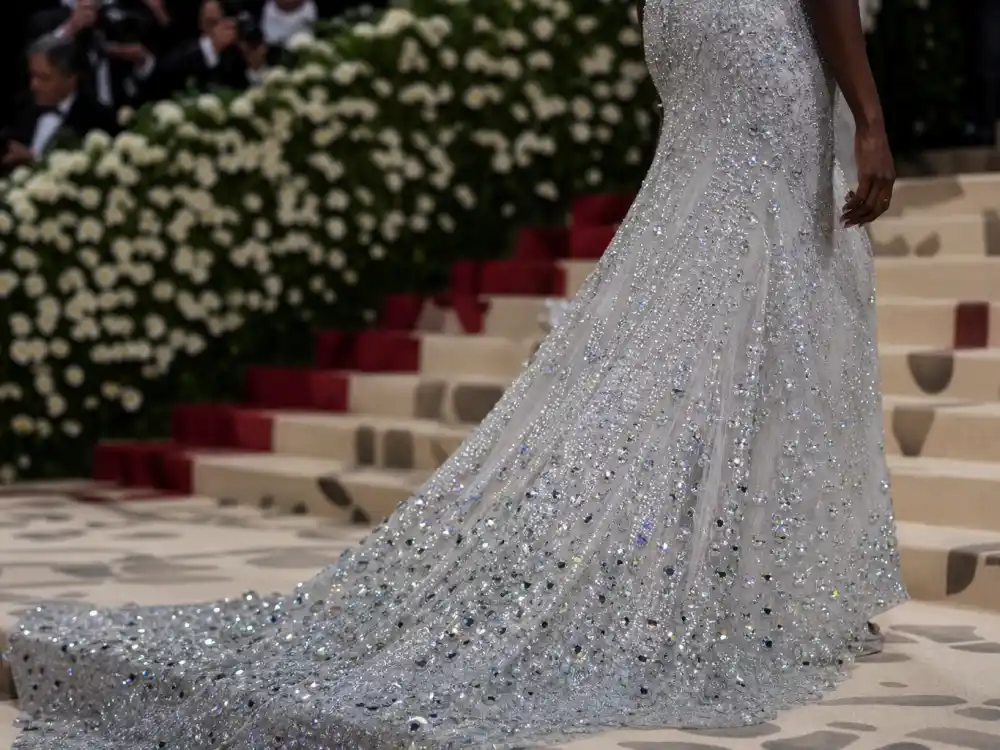 Swarovski crystal couture train detail for Met Gala 2026 best and worst dressed co-chair tier on the Metropolitan Museum staircase
