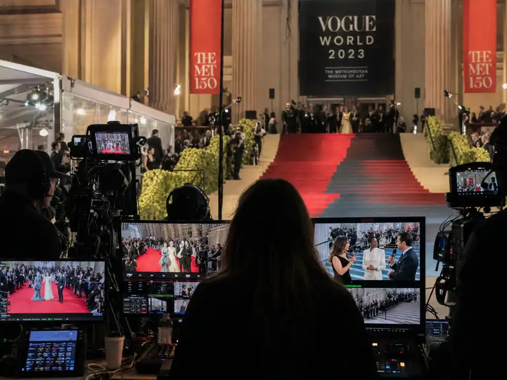 Vogue livestream production on the Met Gala 2026 guest list red carpet with broadcast cameras at the Metropolitan Museum