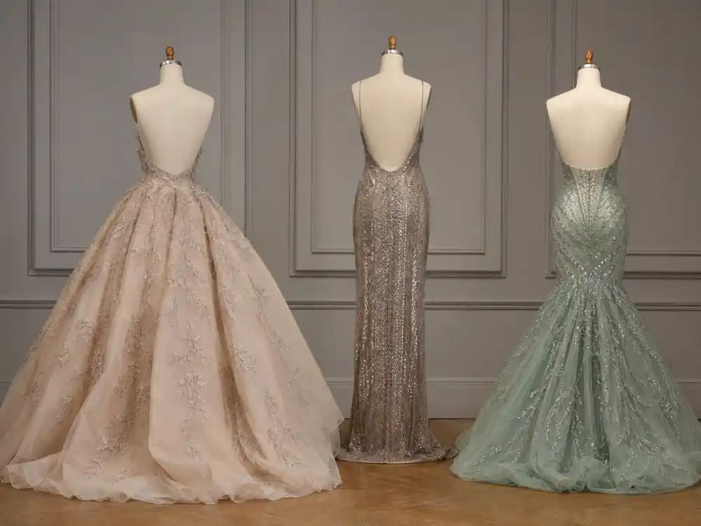 Three evening gown silhouettes on dress forms from behind showing ballgown column and mermaid shapes defining Met Gala best dressed all time proportion codes