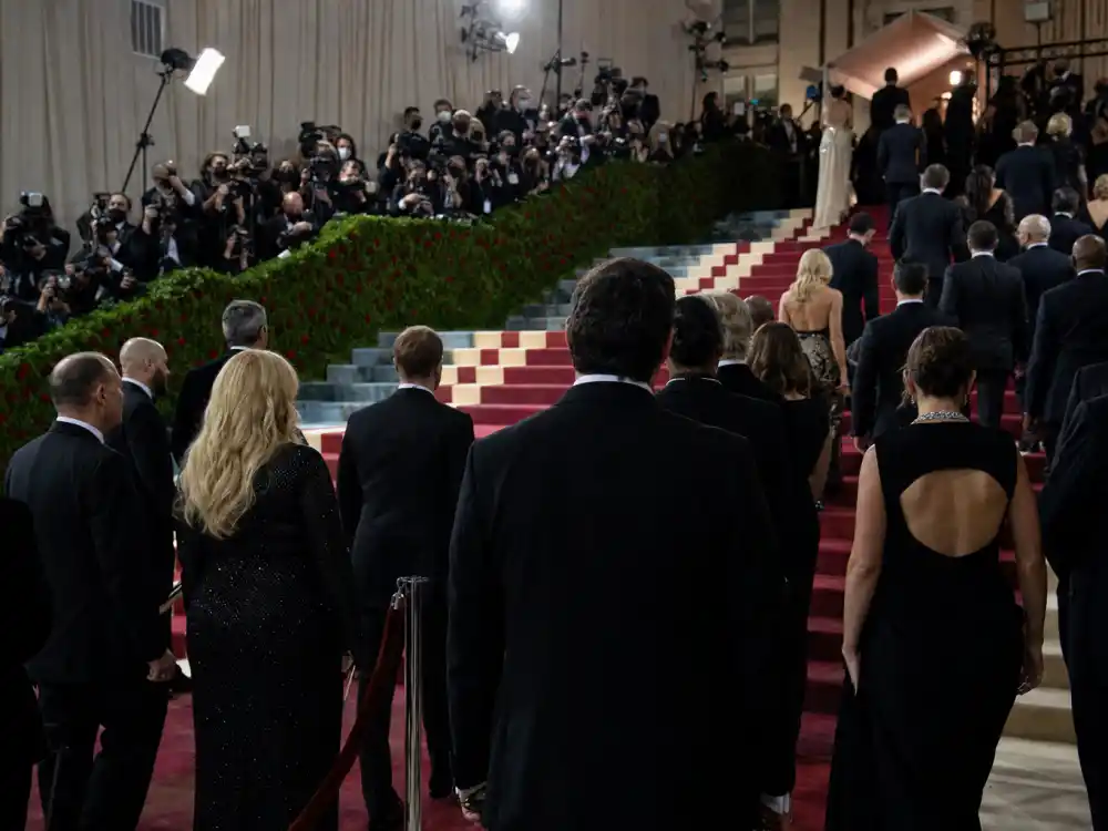 Met Gala most controversial moments ever begin on the red carpet — press photographers and anonymous formal-wear silhouettes on Metropolitan Museum steps