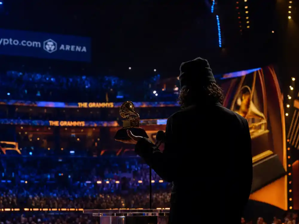 Grammy Awards acceptance speech at podium with golden gramophone trophy — Recording Academy nights produce many of the most memorable acceptance speeches ever