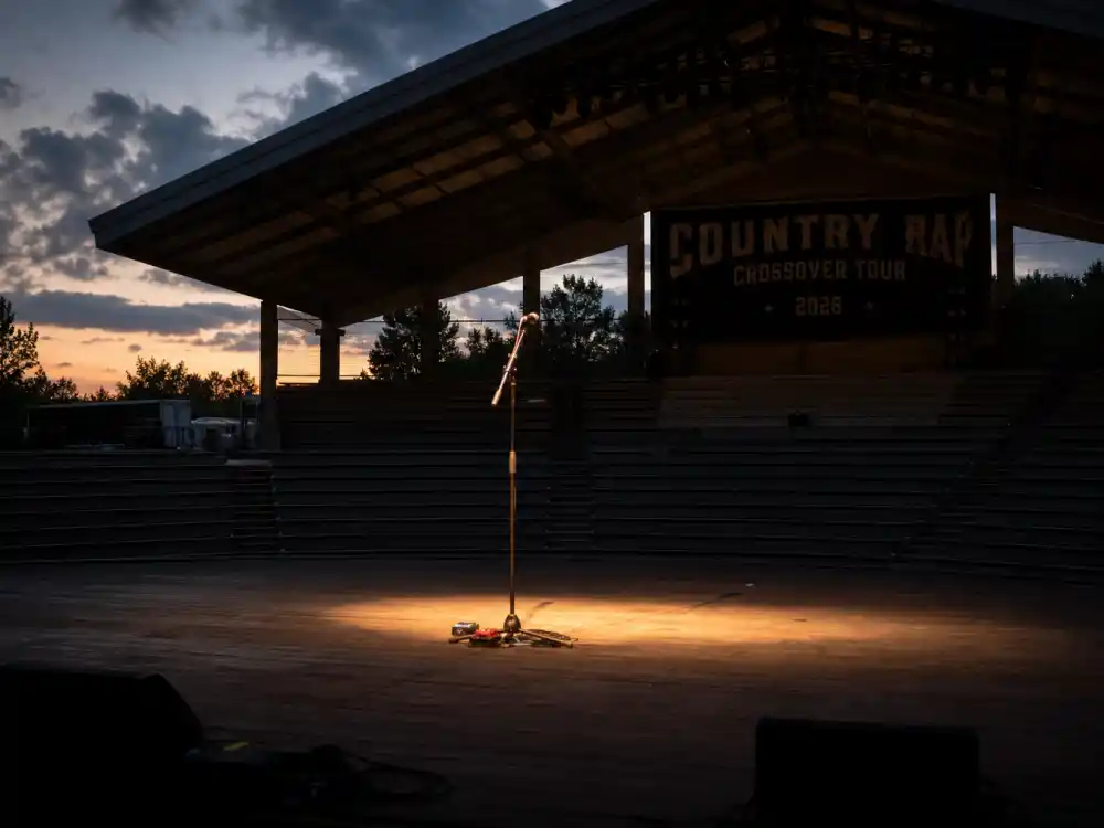Empty amphitheater stage for what happened to Nelly now as a touring veteran in 2026
