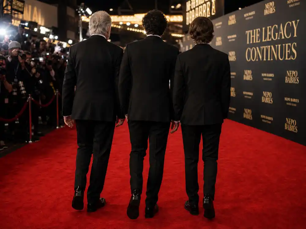 Three-generation red carpet silhouettes from behind in formal wear for nepo babies Hollywood 2026 complete guide generational premiere editorial without faces
