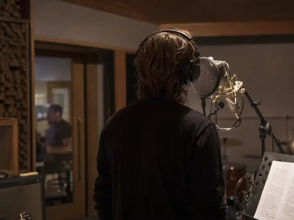 Music studio recording session for nepo babies who made it on their own Zoë Kravitz band career editorial from behind without celebrity faces