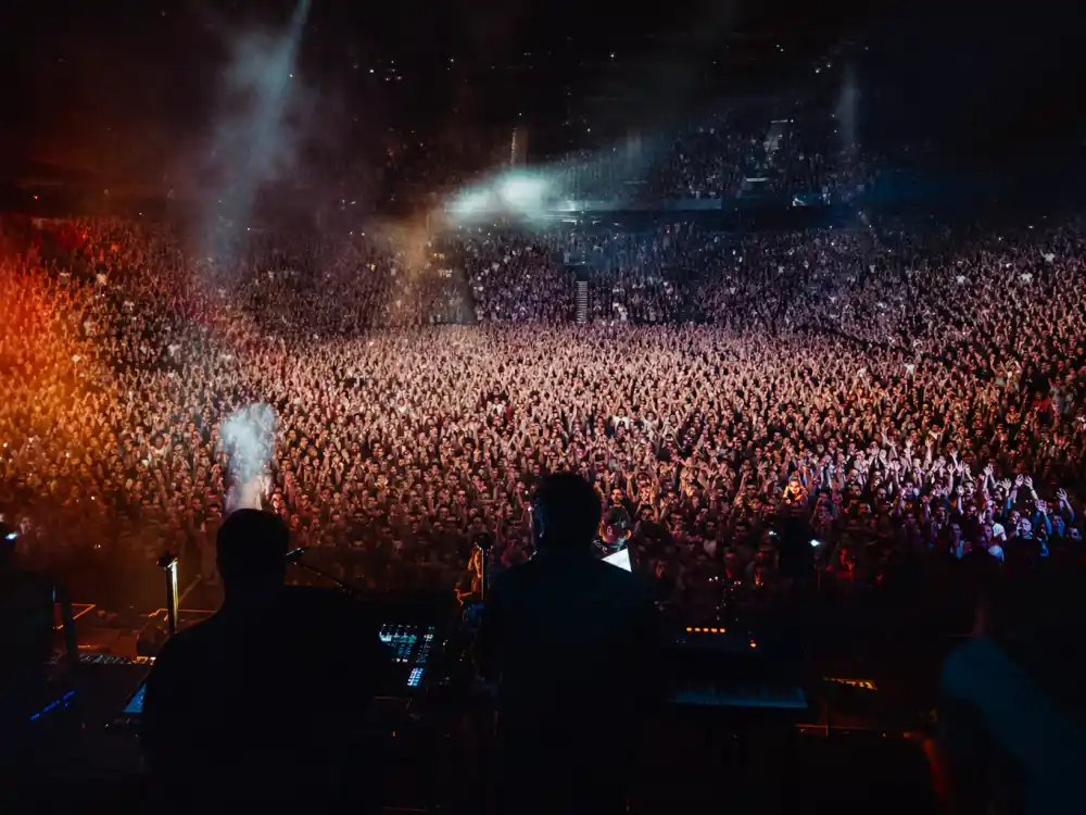 Arena crowd from the stage view shows the massive fan bases behind famous artists who never won a Grammy despite chart dominance
