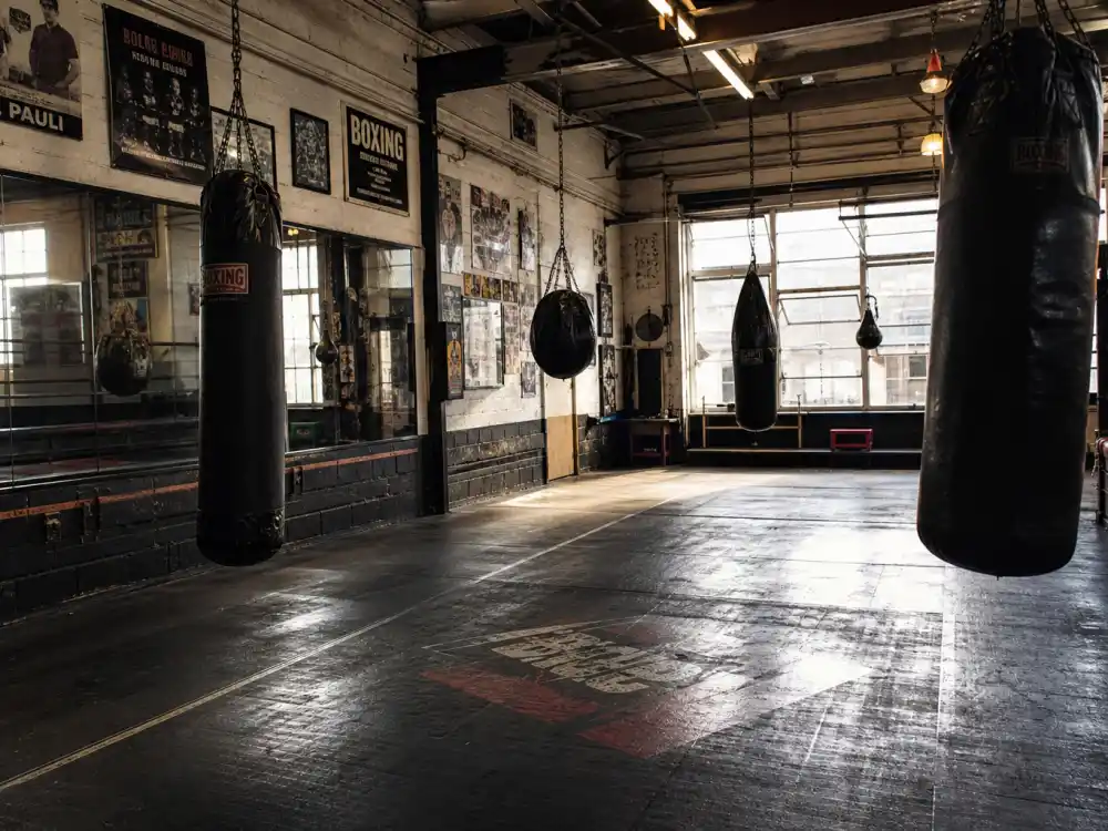 East LA boxing gym heavy bags for where is Oscar De La Hoya now fighter roots and training discipline