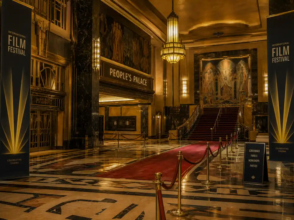 Grand Art Deco theatre lobby evoking the Academy Awards setting for Oscar nominees 2026 season