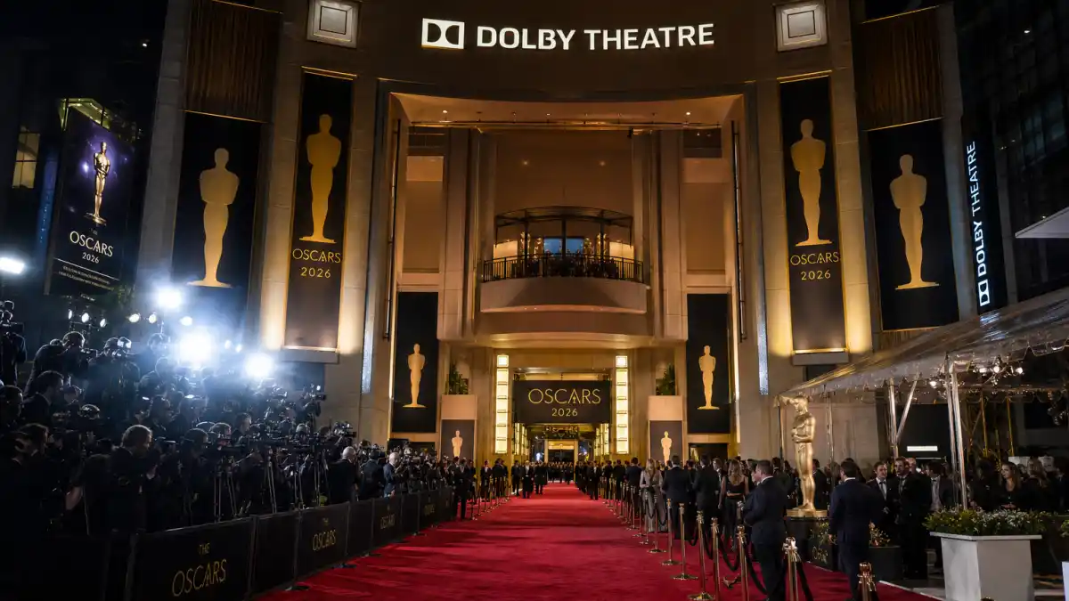 Oscar nominees 2026 — Dolby Theatre red carpet with golden statuette banners and press photographers at the 98th Academy Awards
