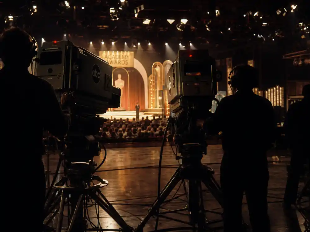 Vintage 1970s television broadcast cameras aimed at the awards stage where the Oscars streaker 1974 forced networks to rethink live delay protocols