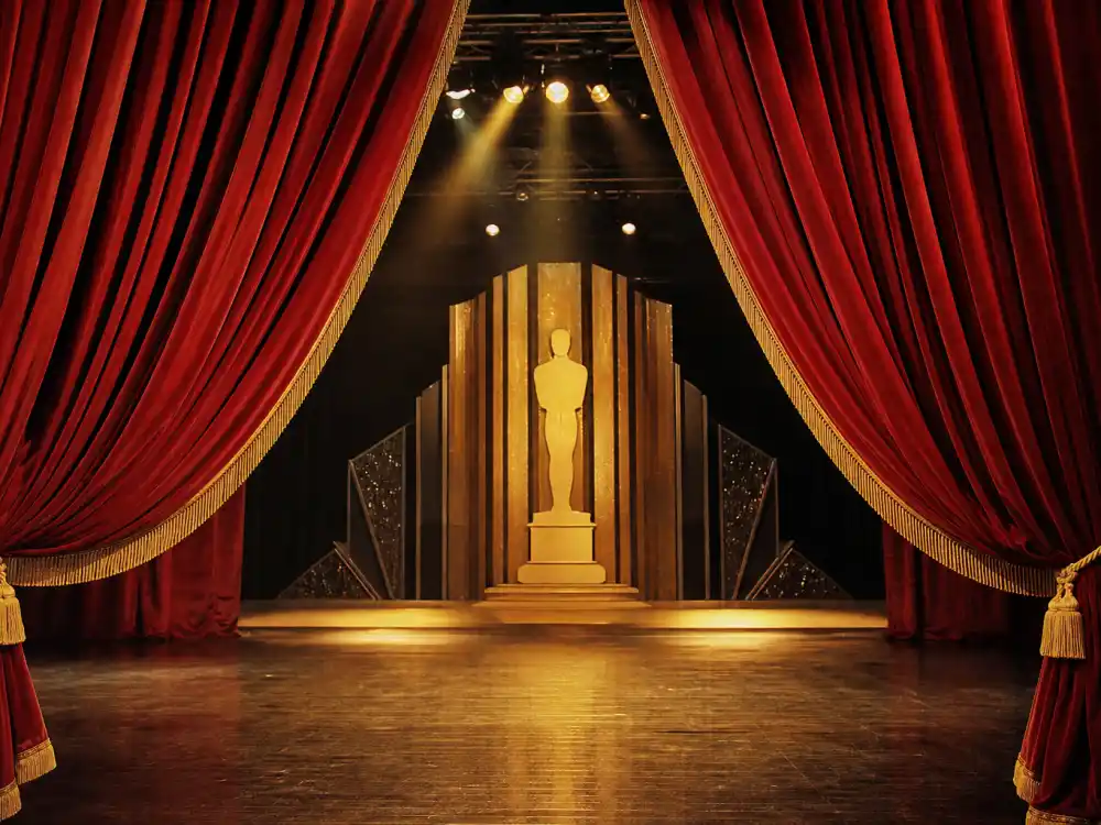 Red velvet stage curtains parting at the 46th Academy Awards theatre where the Oscars streaker 1974 became instant broadcast history