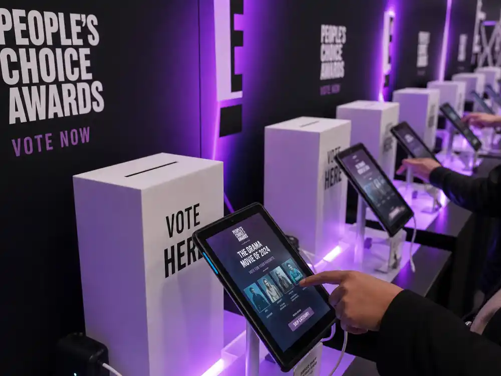 Fan-vote tablet booth for Peoples Choice Awards 2026 winners voting when the 2027 E! telecast returns with online ballots