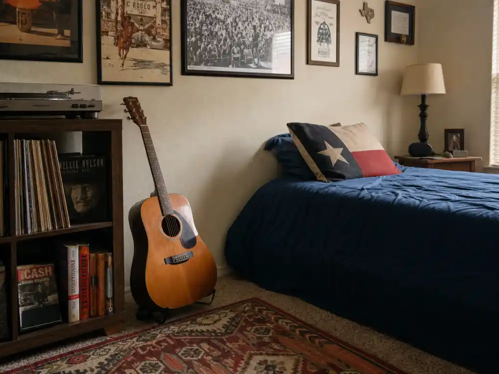 Acoustic guitar in Texas bedroom setup reflecting Post Malone age and birthday 2026 upbringing in Grapevine after his Syracuse, New York birth