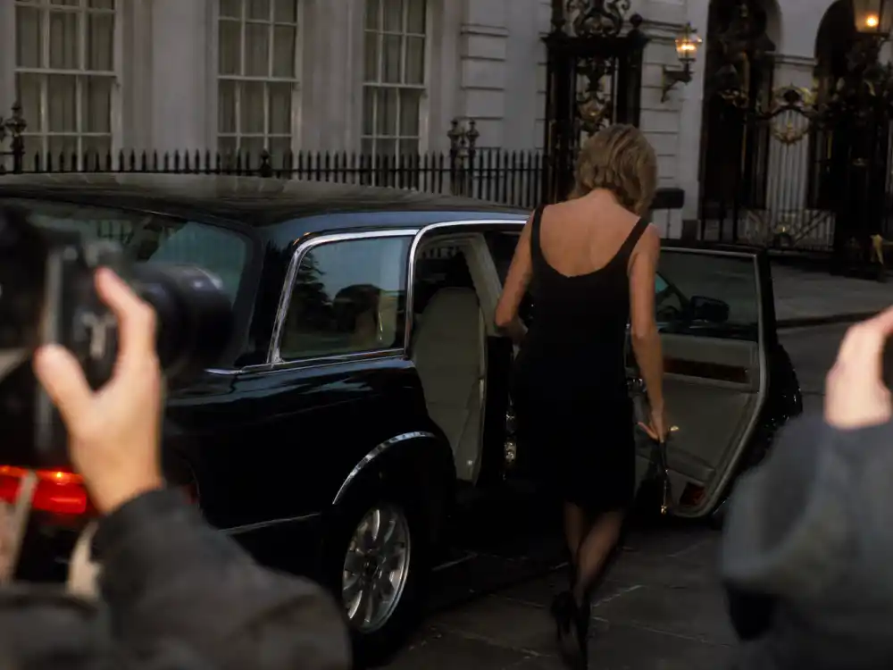 Kensington palace district London evening scene framing the Princess Diana revenge dress story paparazzi era and royal fashion scrutiny
