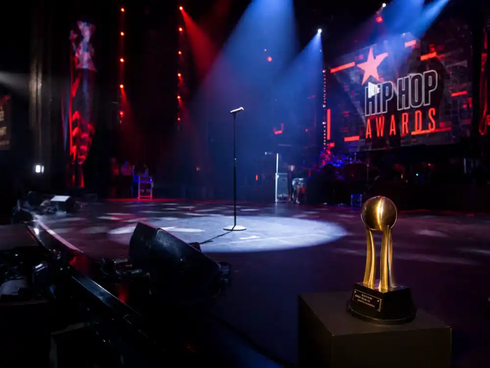Hip-hop concert stage spotlight evokes ceremony nights that crown rappers with the most Grammys each February