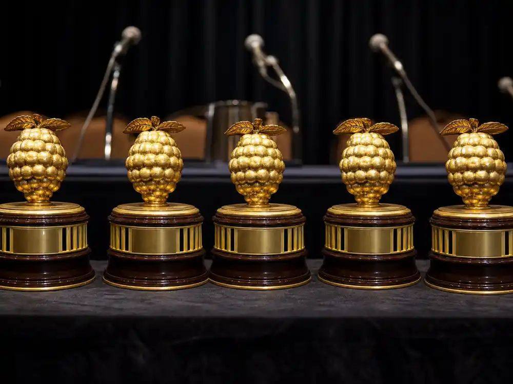 Five golden Razzie Awards 2026 worst picture winners trophies representing War of the Worlds sweep at the 46th Golden Raspberry ceremony