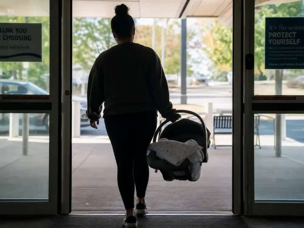 Hospital discharge silhouette from behind for Rihanna baby third child September 2025 Los Angeles birth context