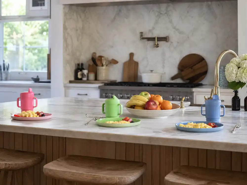 Busy celebrity home kitchen breakfast bar in Rihanna family life Barbados and LA — morning routine visual for three Mayers children co-parenting weeks