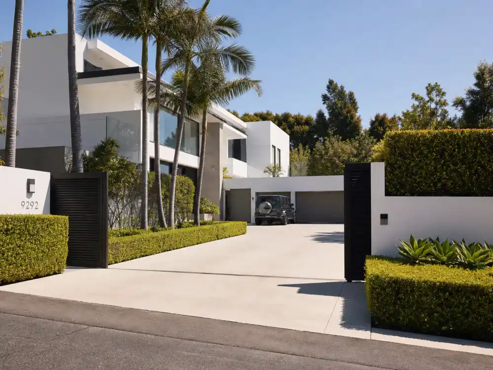 Modern Los Angeles luxury home driveway in Rihanna family life Barbados and LA — gated California residence where Mayers family spends empire-work weeks