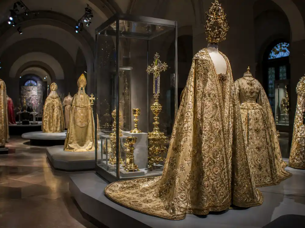 Heavenly Bodies Costume Institute exhibition gallery framing the Catholic imagination theme behind the Rihanna papal Met Gala outfit debut