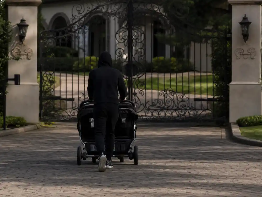 Gated home stroller silhouette for Rihanna sons RZA and Riot Rose guide privacy era — face-forward minor photos posted on family schedule