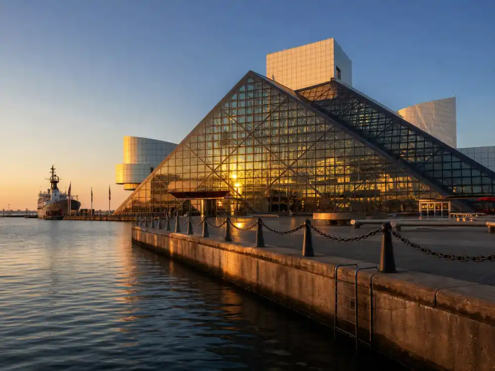 Rock and Roll Hall of Fame museum pyramid on Cleveland lakefront where the induction ceremony returns in 2027 for future inductees