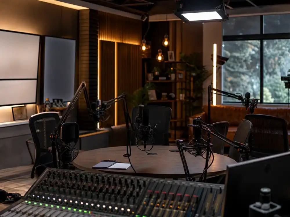 Modern podcast studio representing where the Roseanne cast where are they now alumni work in 2026 media