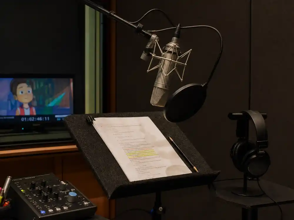 An animation voice-over booth with microphone representing Sean Astin voice acting and producing career