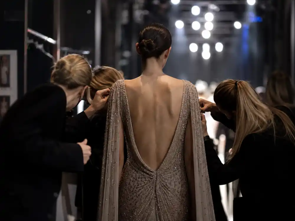 Paris fashion week runway backstage from behind for second generation celebrities dominating 2026 Kaia Gerber Chanel catwalk lane editorial without identifiable faces