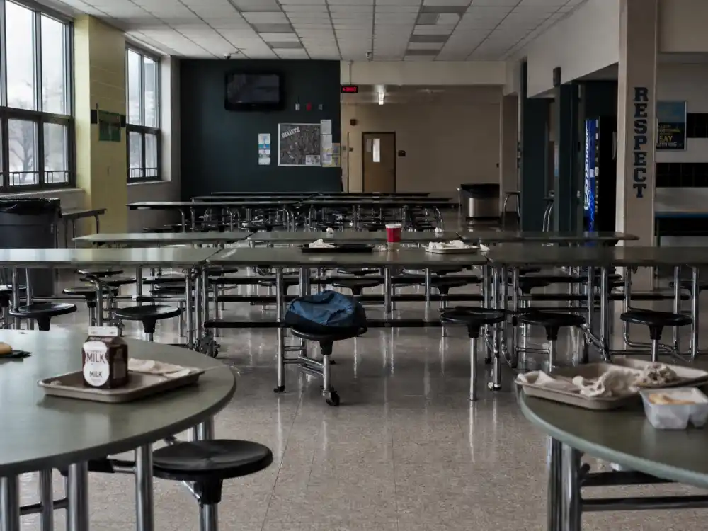 Empty school cafeteria for what happened to Star Wars Kid after cyberbullying and psychiatric treatment