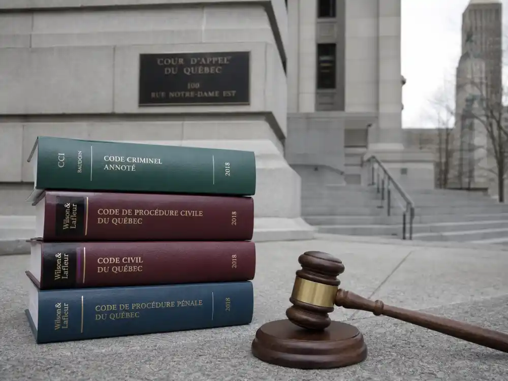 Law books and Quebec courthouse for what happened to Star Wars Kid after McGill law school and bar admission